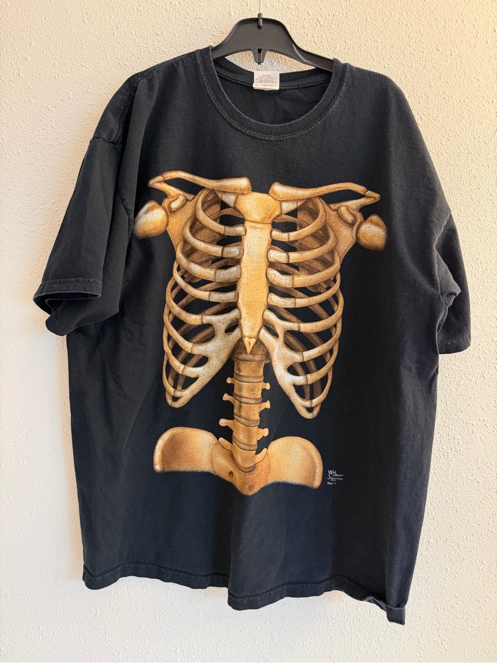Vintage Black Skeleton Graphic Tee with Gold Ribcage Print